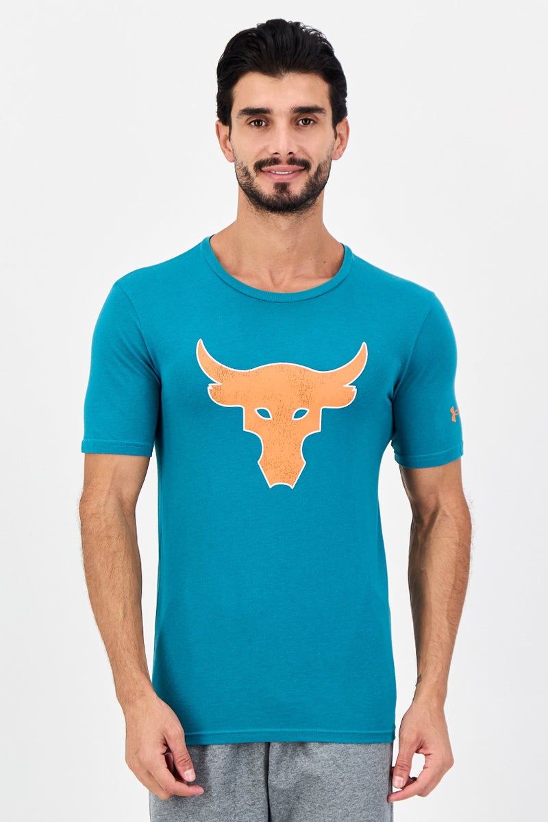 UNDER ARMOUR تي شيرت خارجي قصير الأكمام للرجال من أندر أرمور × مشروع روك، أخضر مزرق - Image 1